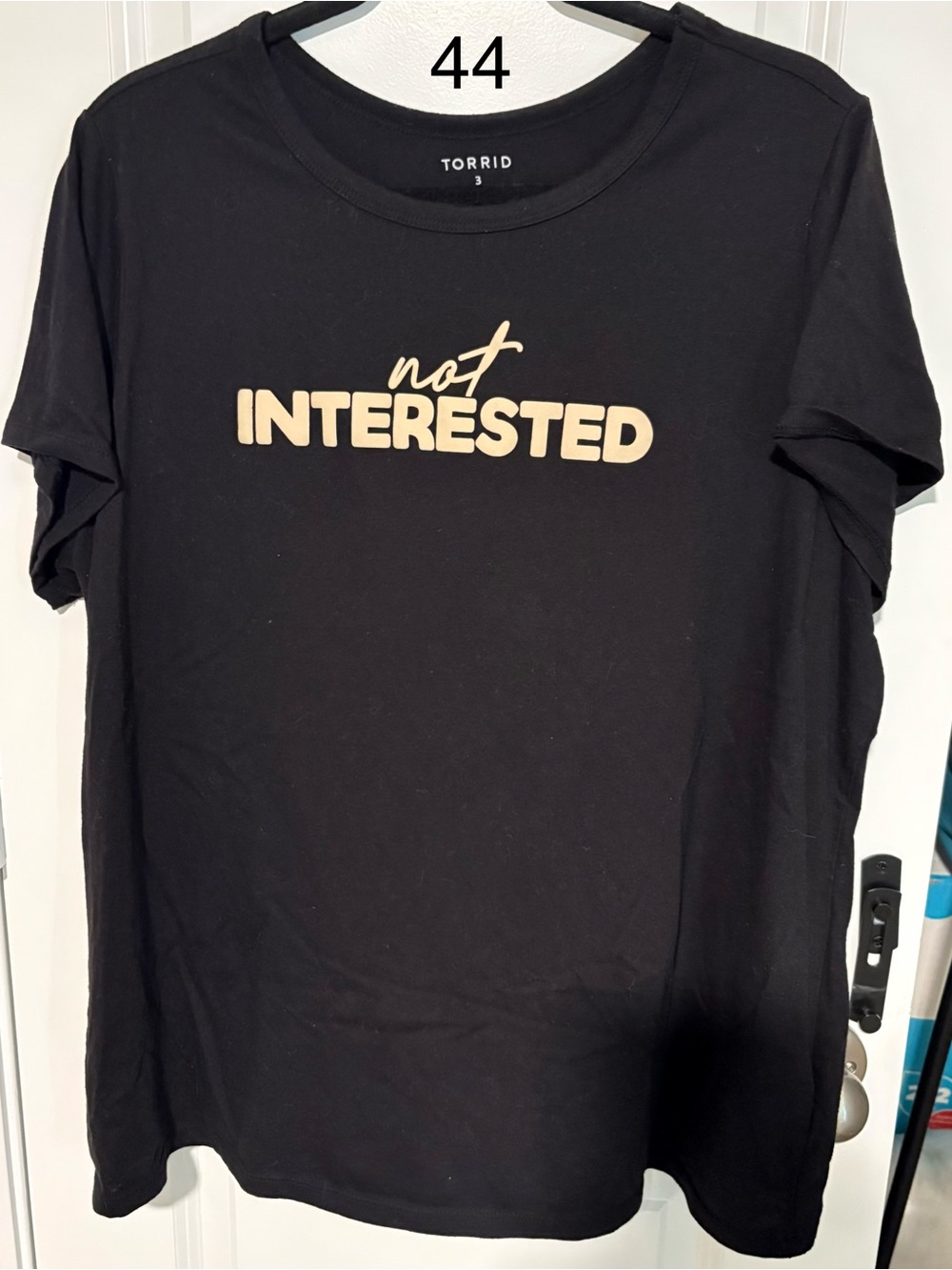 torrid Black Graphic Tee with Beige "Not Interested" Print